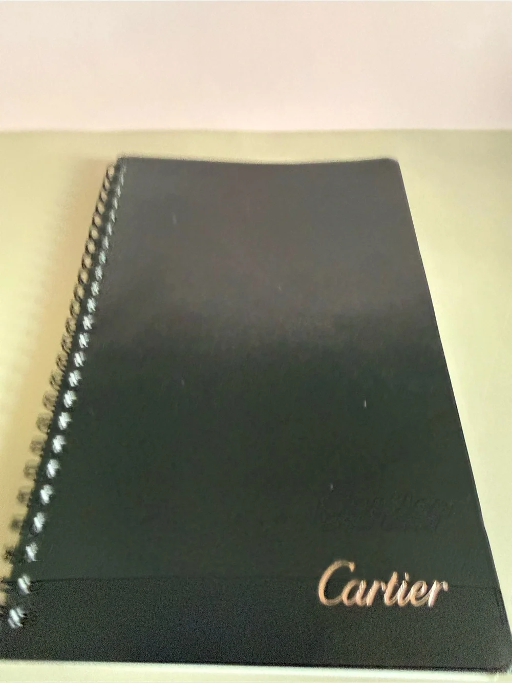 Cartier Black Notebook with Gold Logo